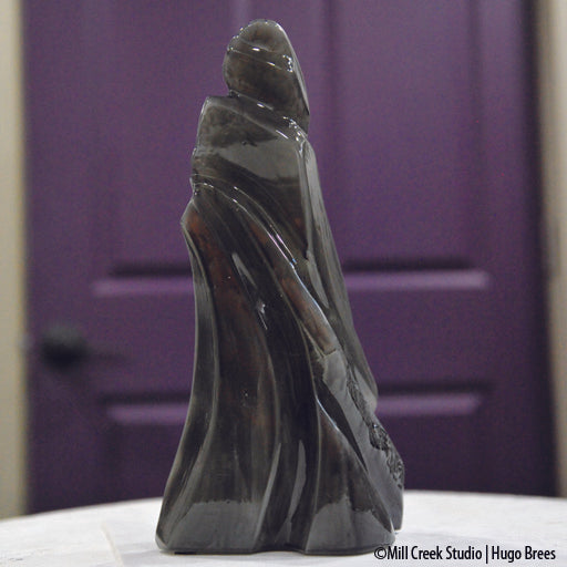 The silent maiden sculpted in green-tinted Italian Soapstone.