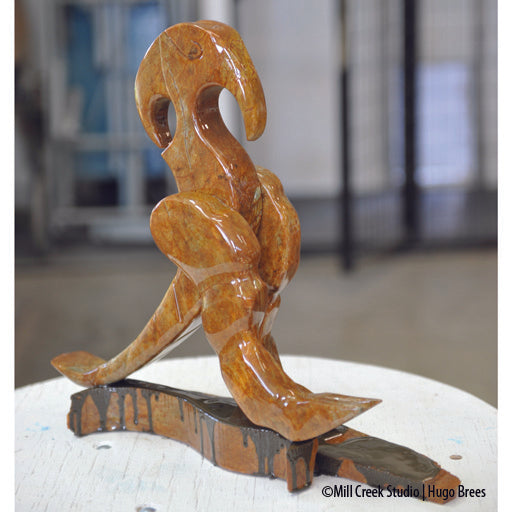 This mighty being is an additive sculpture worked with copper Brazilian Soapstone.