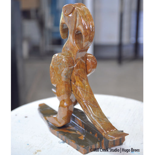 This mighty being is an additive sculpture worked with copper Brazilian Soapstone.