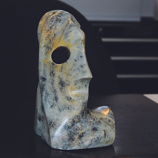 Brazilian Soapstone Sculpture in greens, copper and mottled black stone.