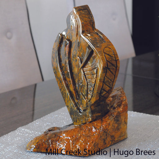 Striking copper-green abstract Brazilian Soapstone sculpture.