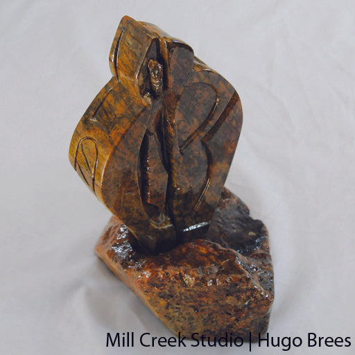 Striking copper-green abstract Brazilian Soapstone sculpture.