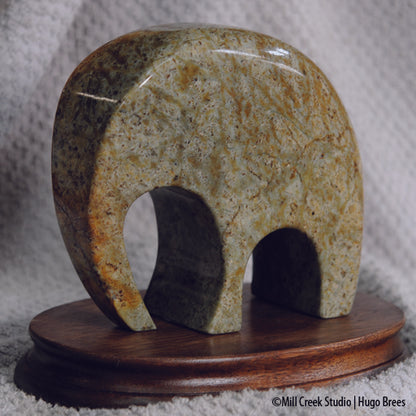 This green-copper Brazilian Soapstone elephant sculpture is a nod to the U.S. governing system.