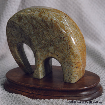 This green-copper Brazilian Soapstone elephant sculpture is a nod to the U.S. governing system.